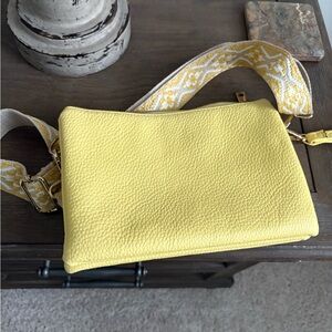 Chic Yellow Crossbody Bag with Patterned Strap